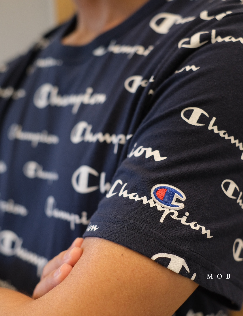 CHMPSST1603 All Over Repeating Logo Tee Navy (S ONLY)