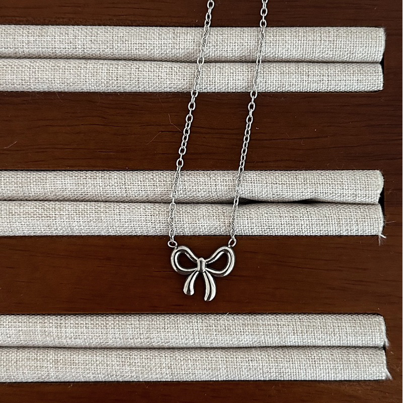 Louisë // Gold Tiny Bows in Copenhagen Necklace - 18k Gold Plated Titanium Steel (Anti Karat)