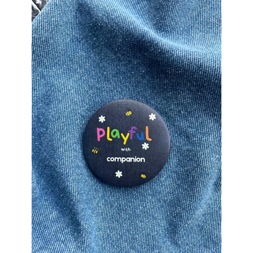 Image of playful pin badge peniti by colour company