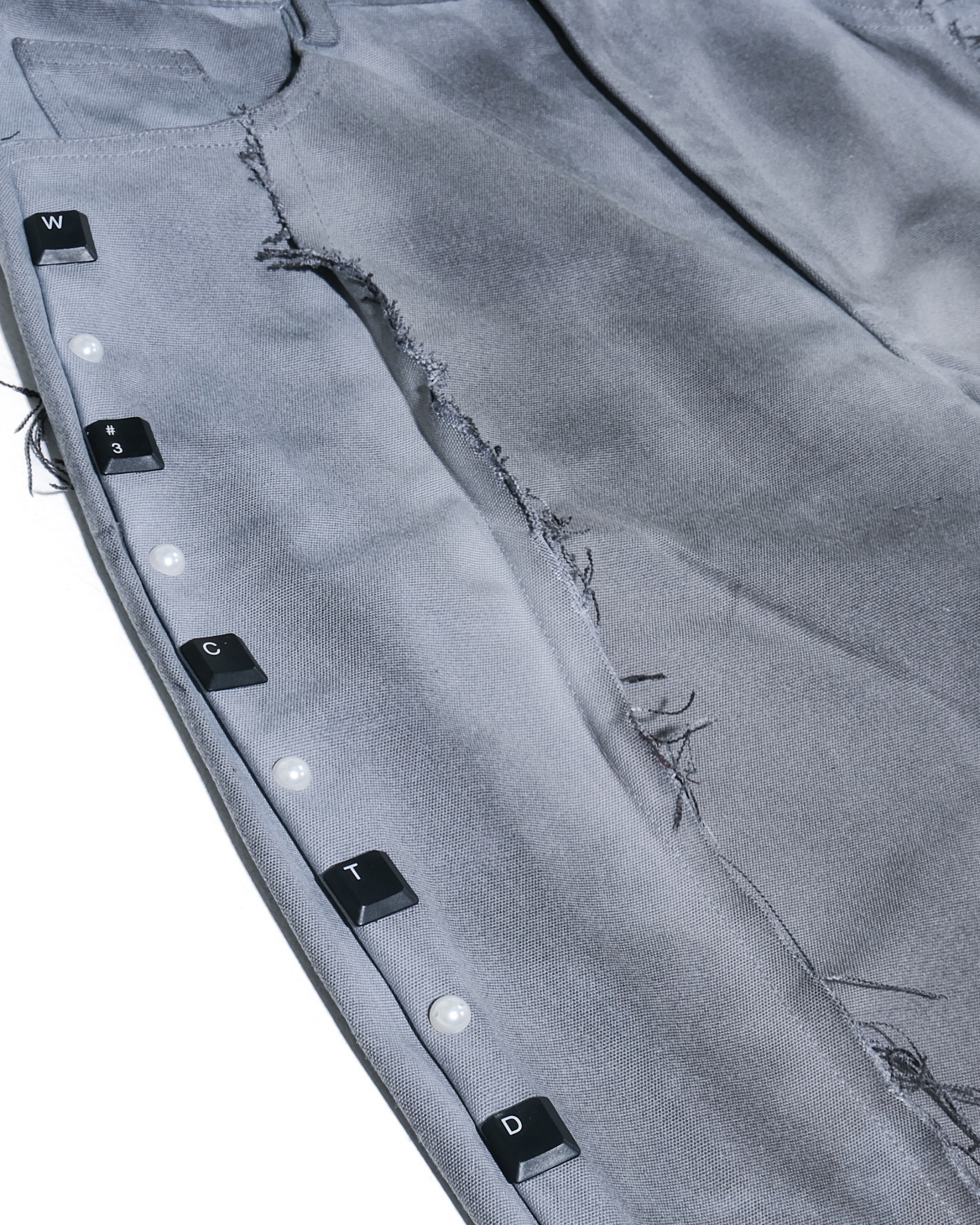 PUSS X BUTTON LIGHT GREY PANTS