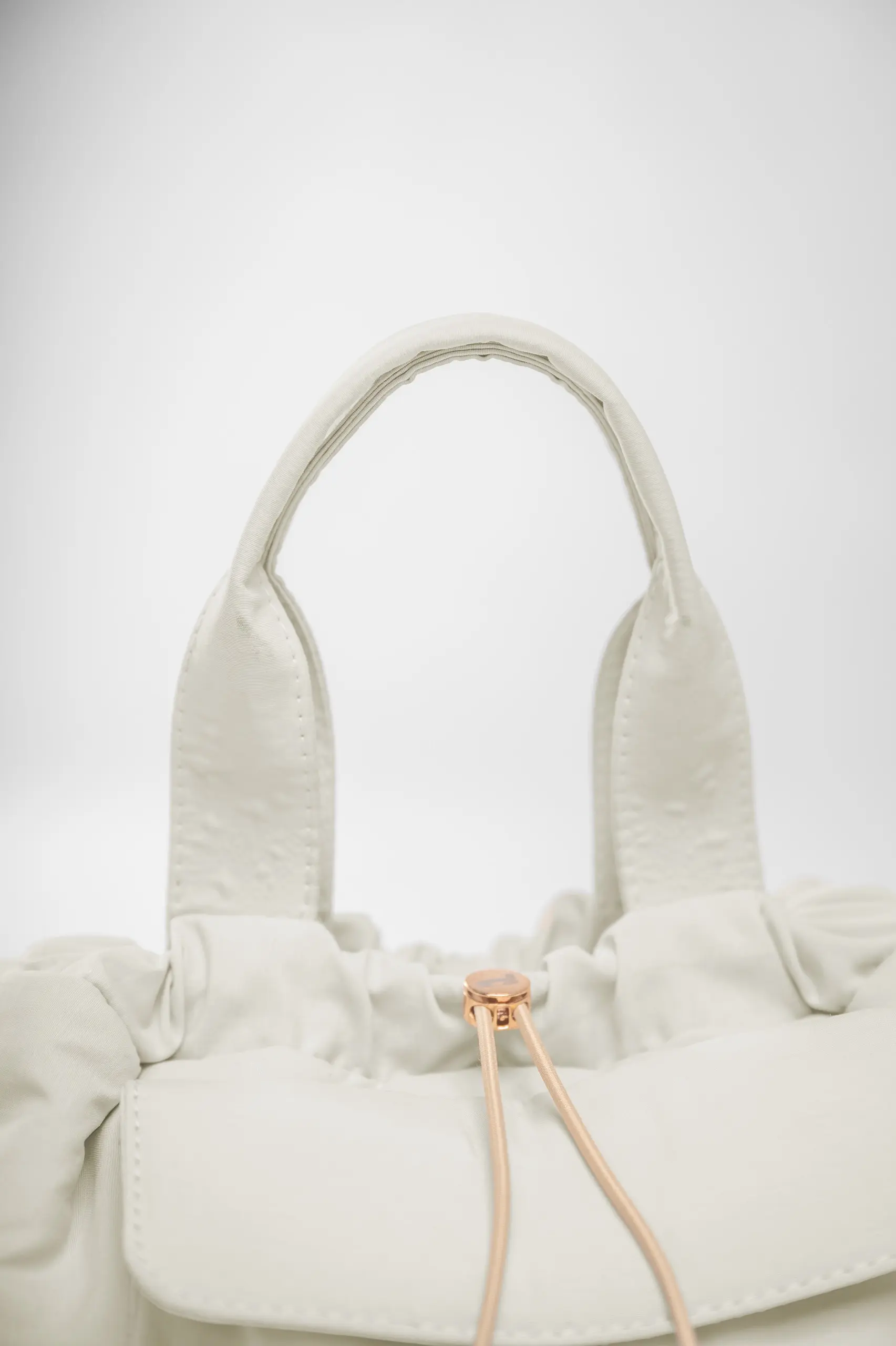 RUNERA SLING BAG BONE