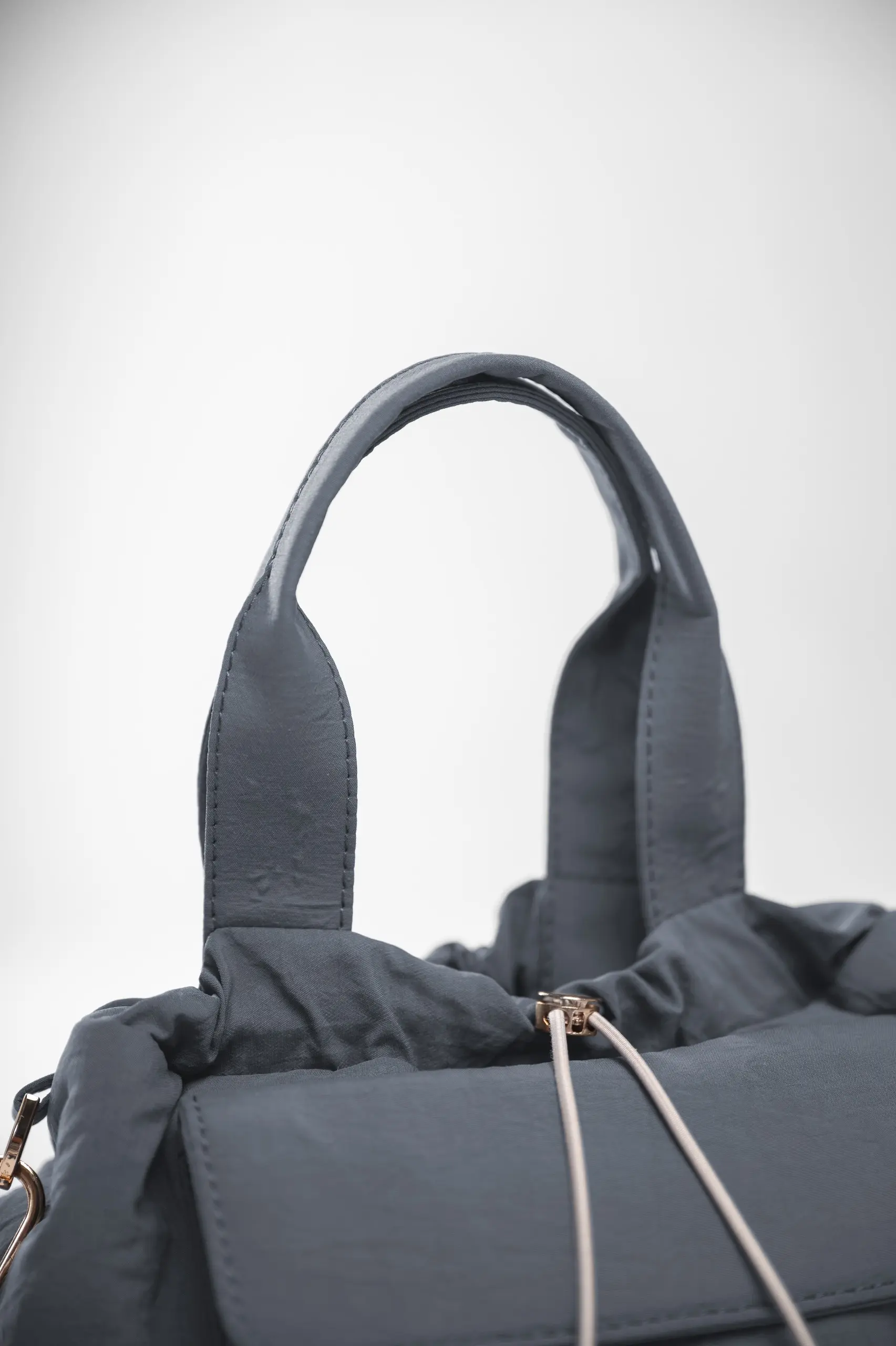 RUNERA SLING BAG CHARCOAL
