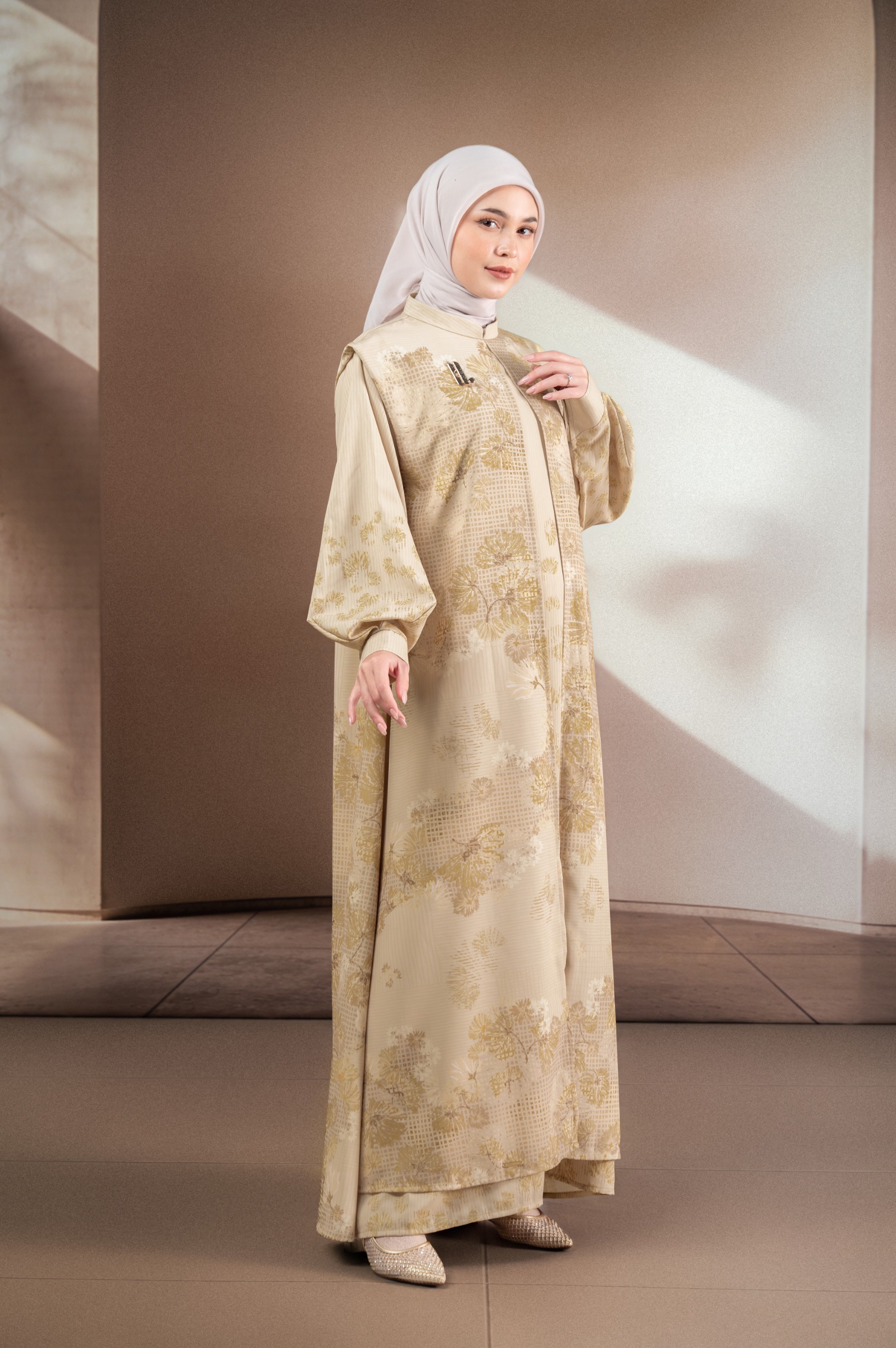 GAUN BERMOTIF ELOK