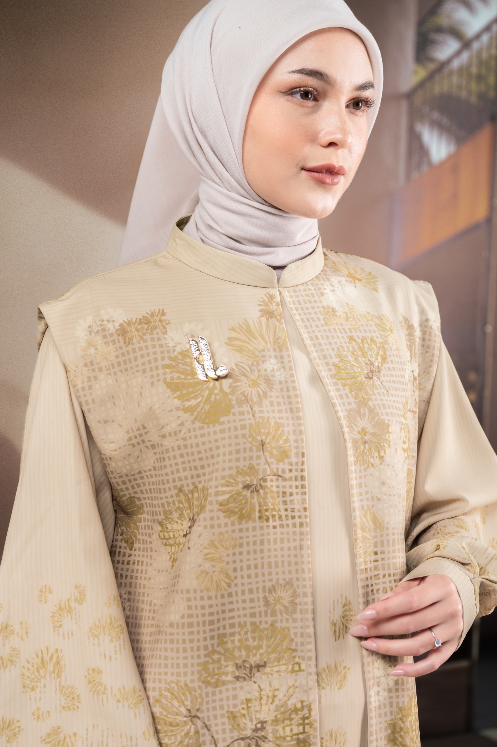 GAUN BERMOTIF ELOK