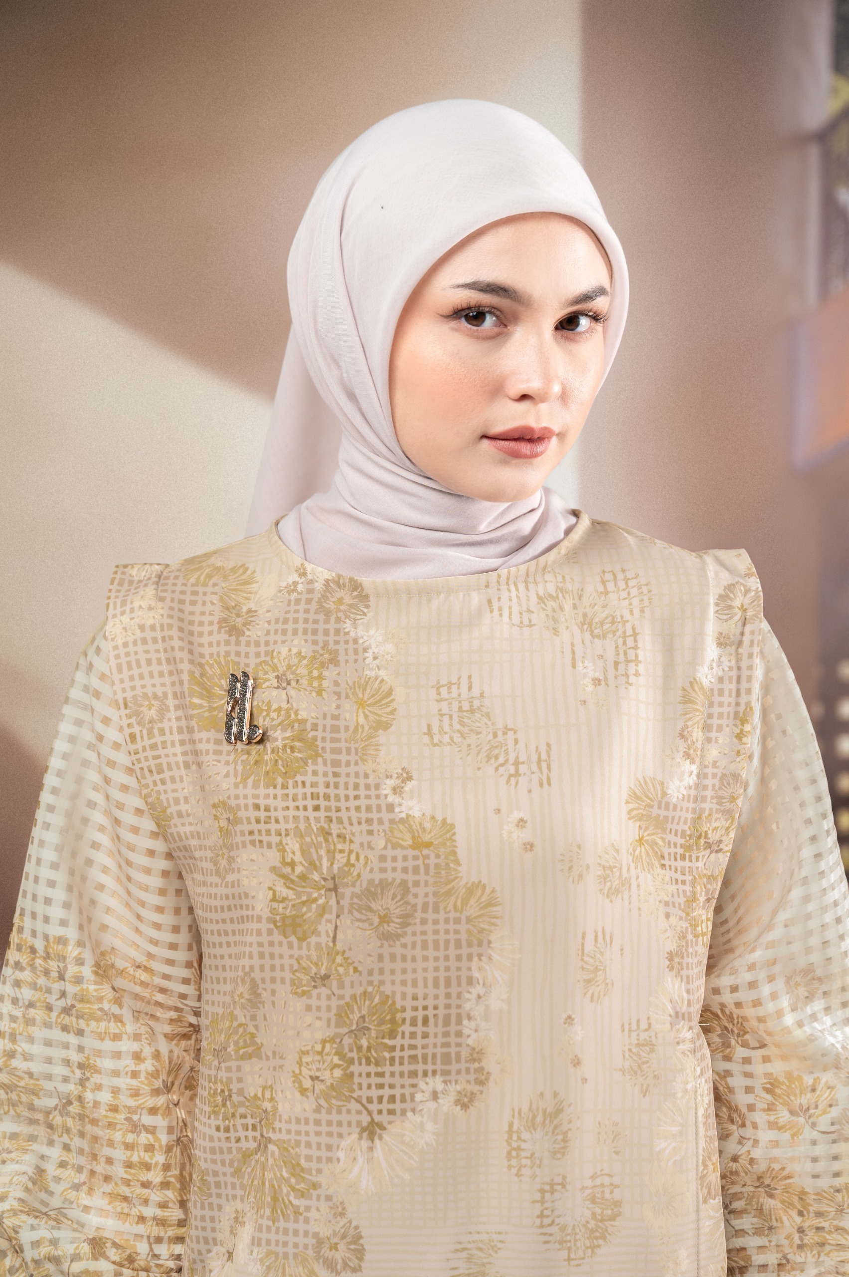 TUNIK BERMOTIF ELOK