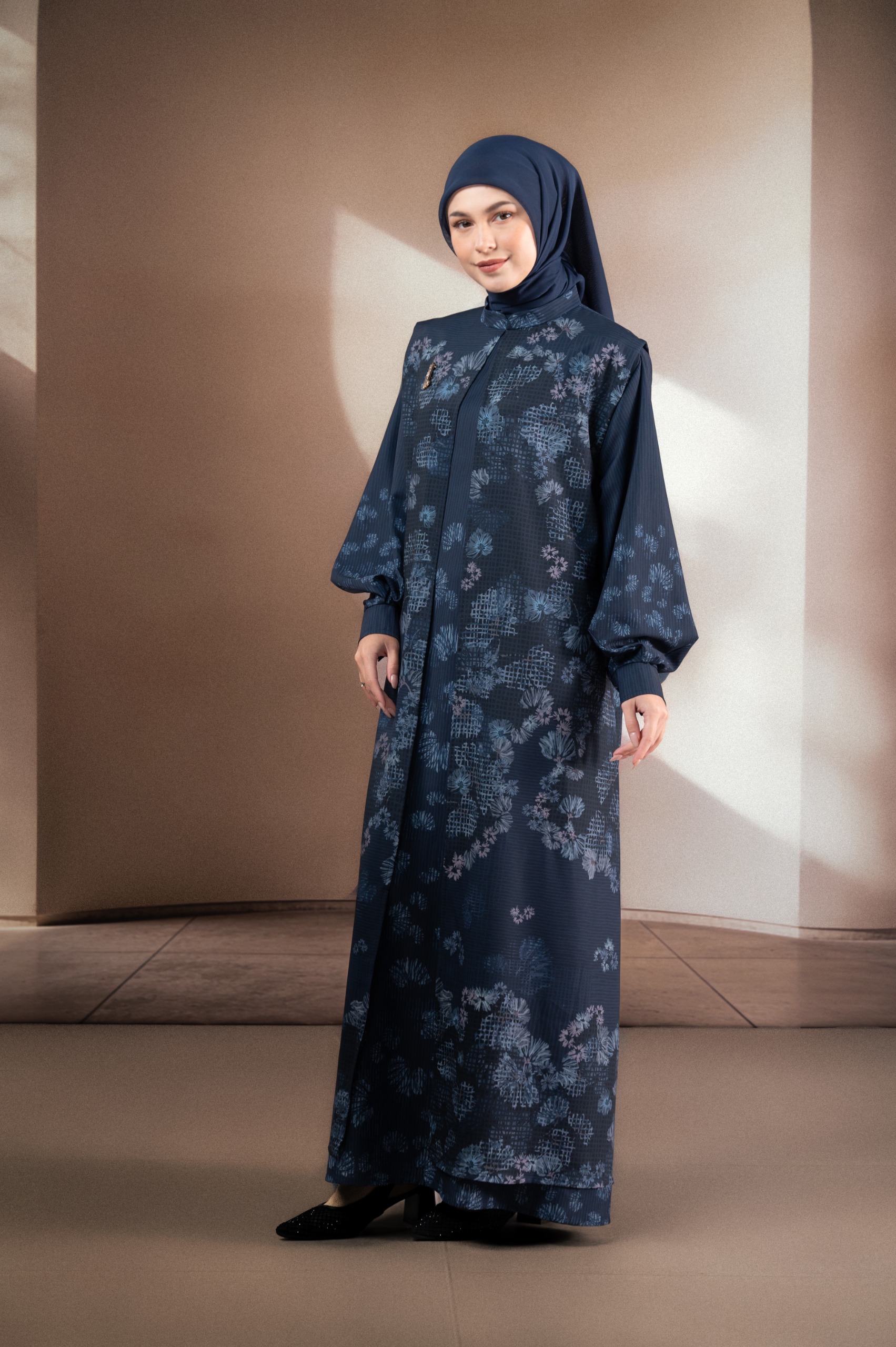 GAUN BERMOTIF ELOK