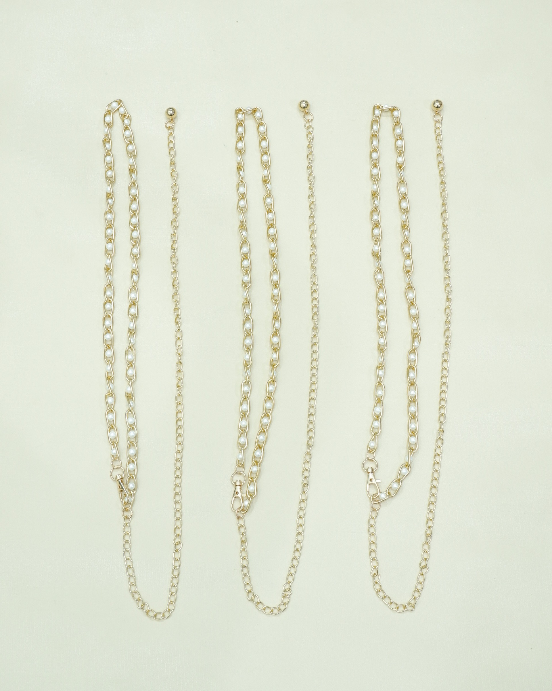ACCESORIES BELT CHAIN GOLD AND WHITE PEARL BELT 
