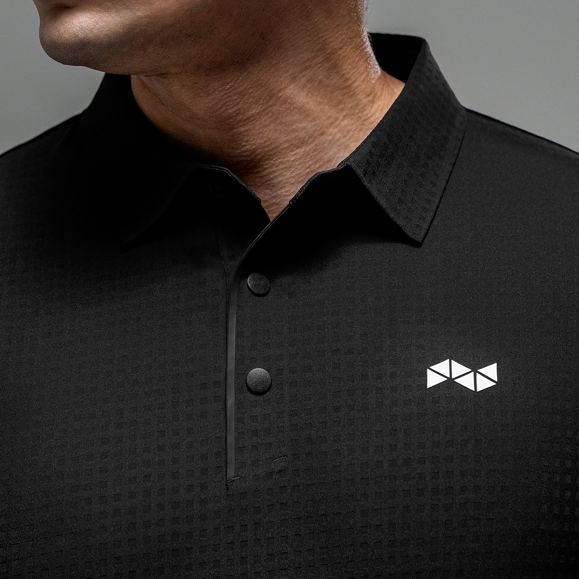 NEVERES Next Level Polo Shirt - Performa-Grid Tech