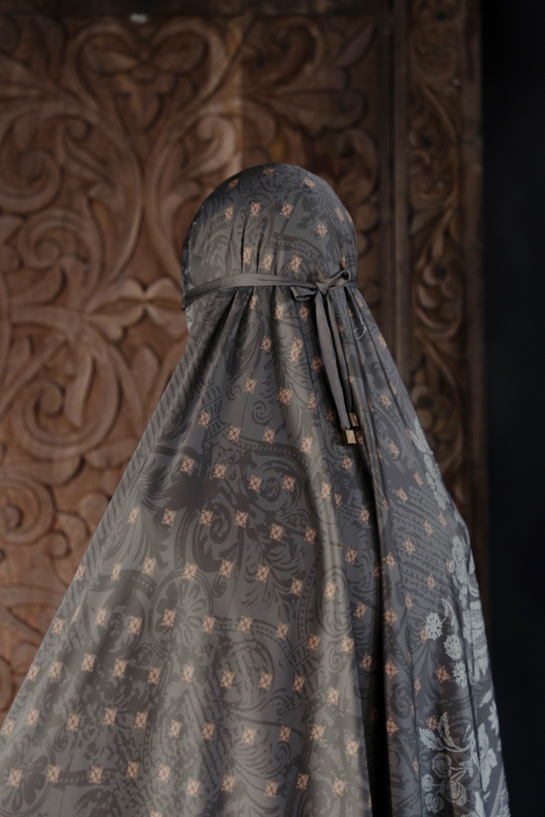 Mukena Agam Arang