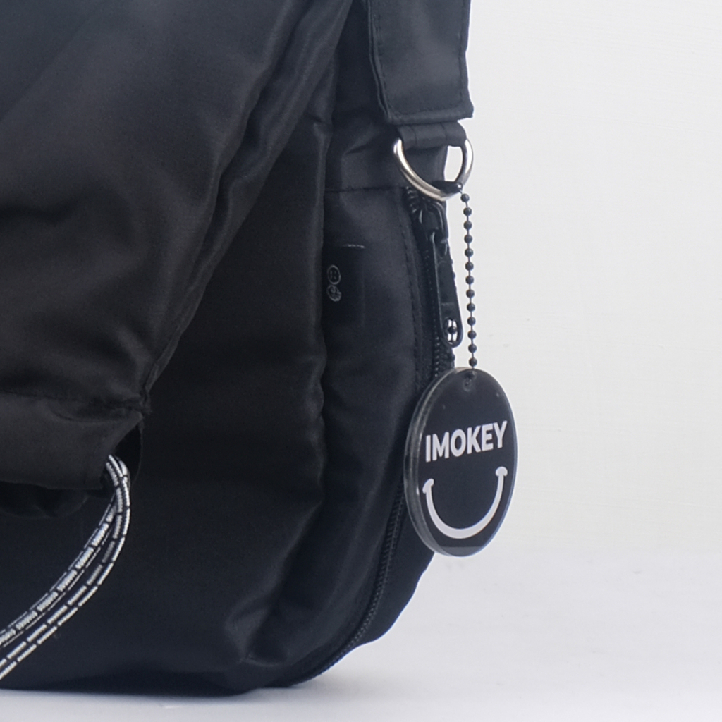 Imokey Oui Expandable Sling Bag