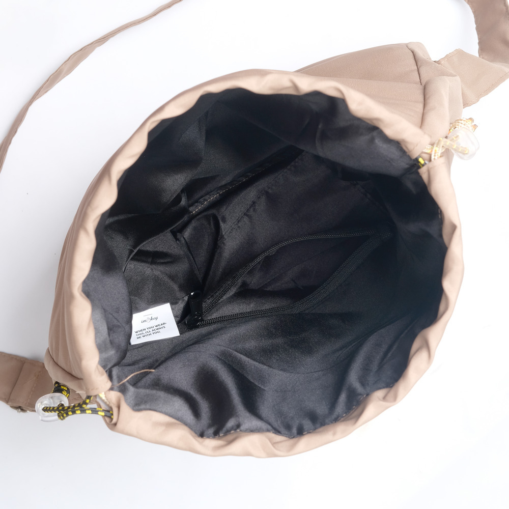 Imokey Oui Expandable Sling Bag
