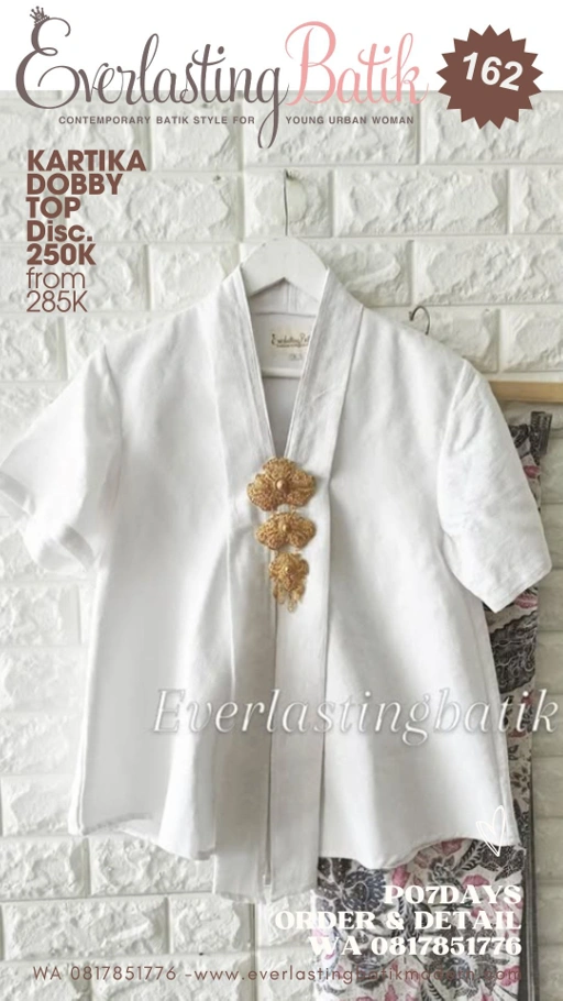 Image of 9112 Ririn Ferianto model  : KARTIKA DOBBY TOP size /LD baju : XL - LD 96 CM Panjang lengan : PANJANG 52 CM Panjang baju : 70 CM Furing : Tricod .    Ket : BW Harga diskon  : 255K
