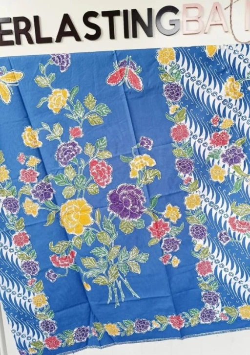 Image of 9116 Sonya Sukotjo  model  : KINARA ROK LILIT ENCIM  size/L.Pinggang pas : FREESIZE Panjang rok  : 94 CM Furing : Tricod .    Ket : WARNA BIRU MUDA Harga rok stlh diskon : 300K