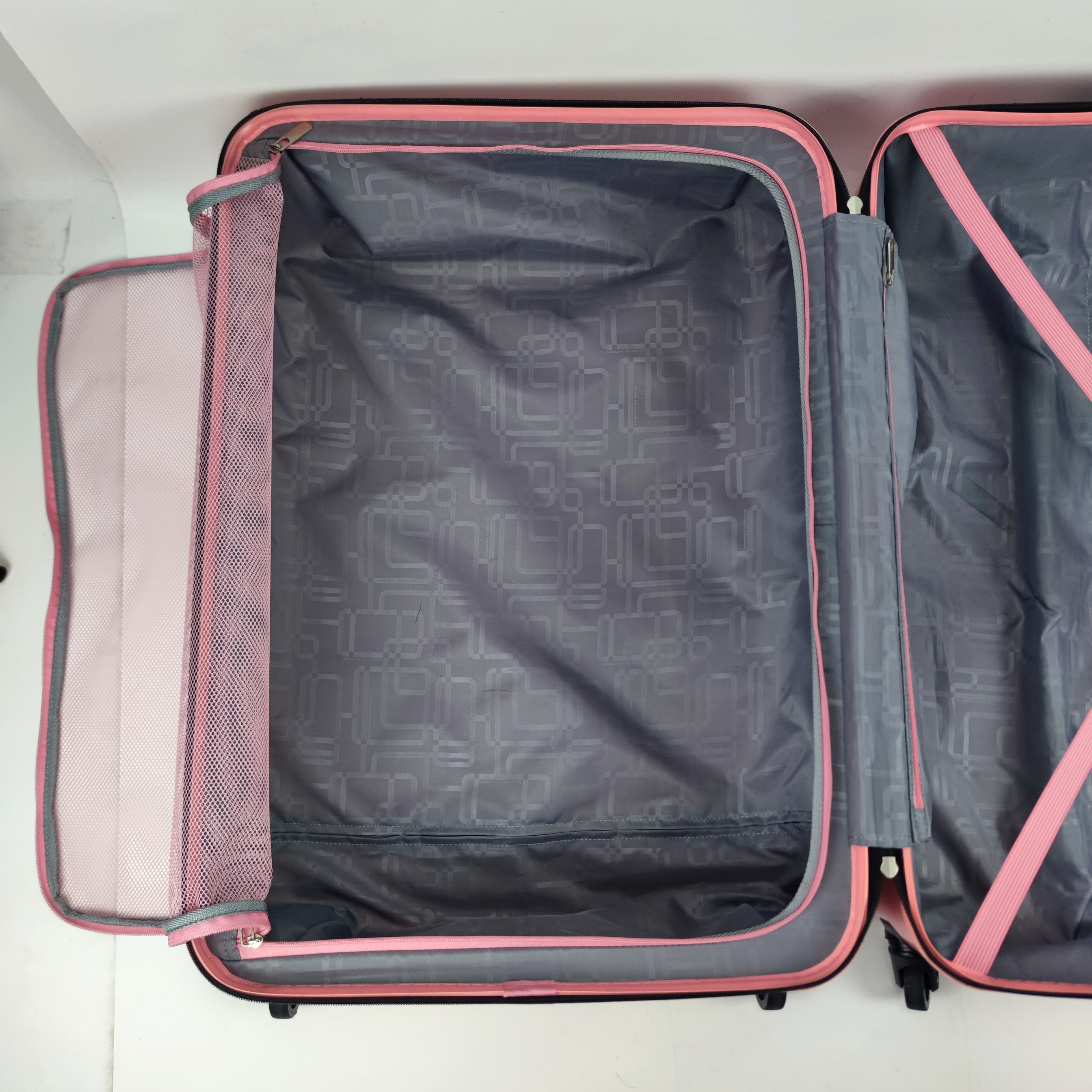 American Tourister Puzzle Cube Spinner Hardcase Luggage 28 Inch Pink