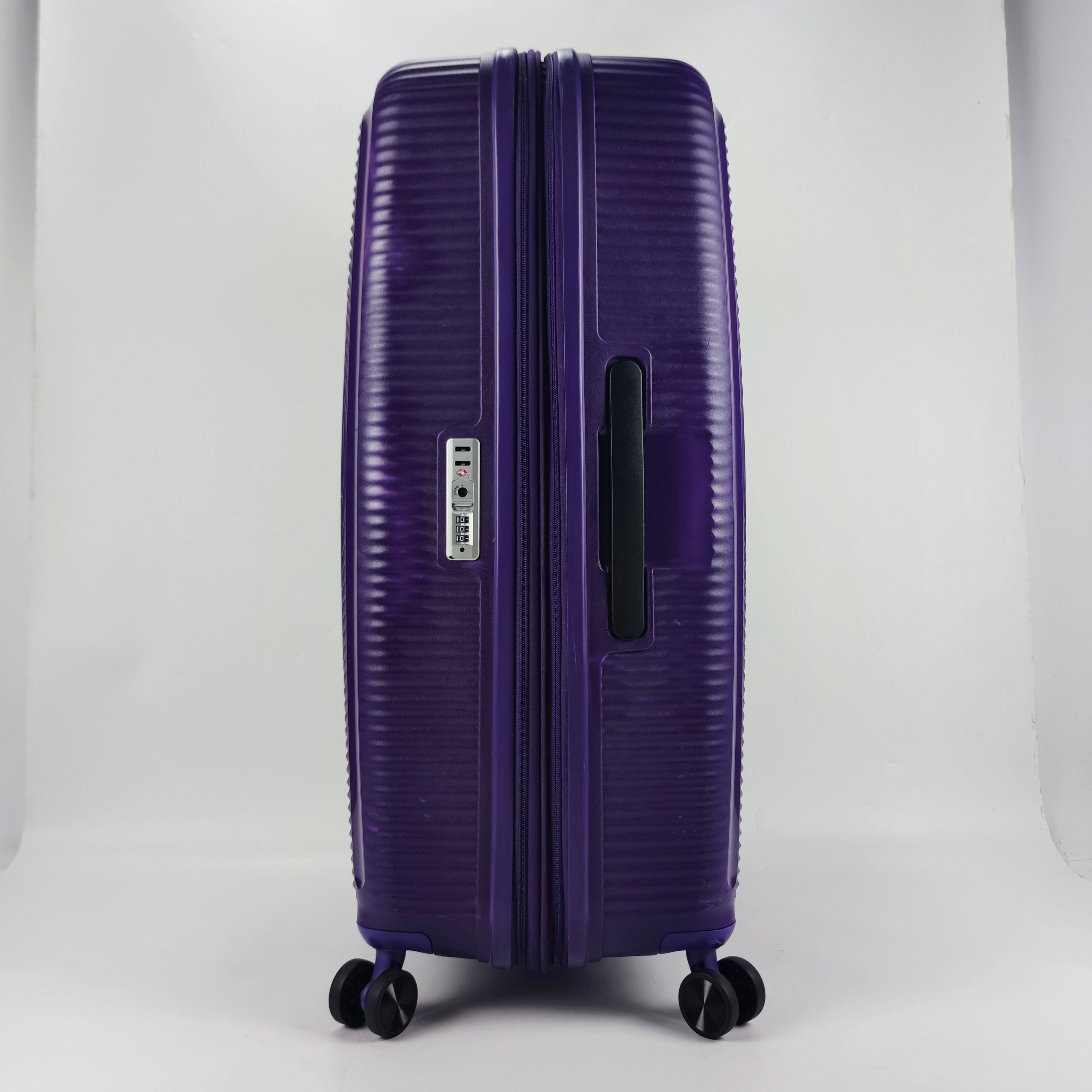 American Tourister Curio Soundbox Spinner Hardcase Luggage 30 Inch Purple