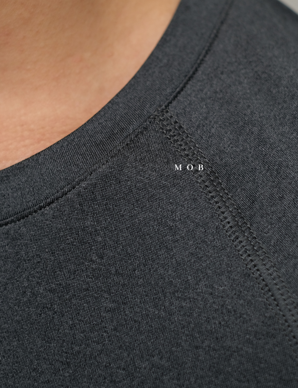 PMBL01002 Warmcell Baselayer Story Logo Charcoal