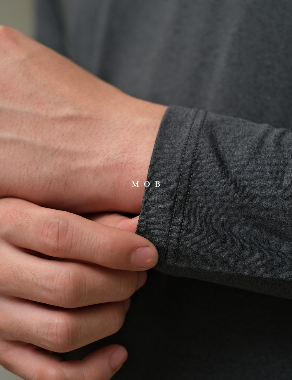 PMBL01002 Warmcell Baselayer Story Logo Charcoal
