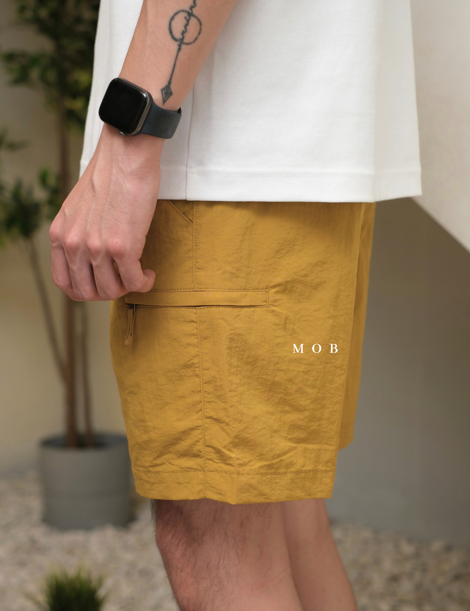 UNQSR02004 Active Nylon Shorts Mustard