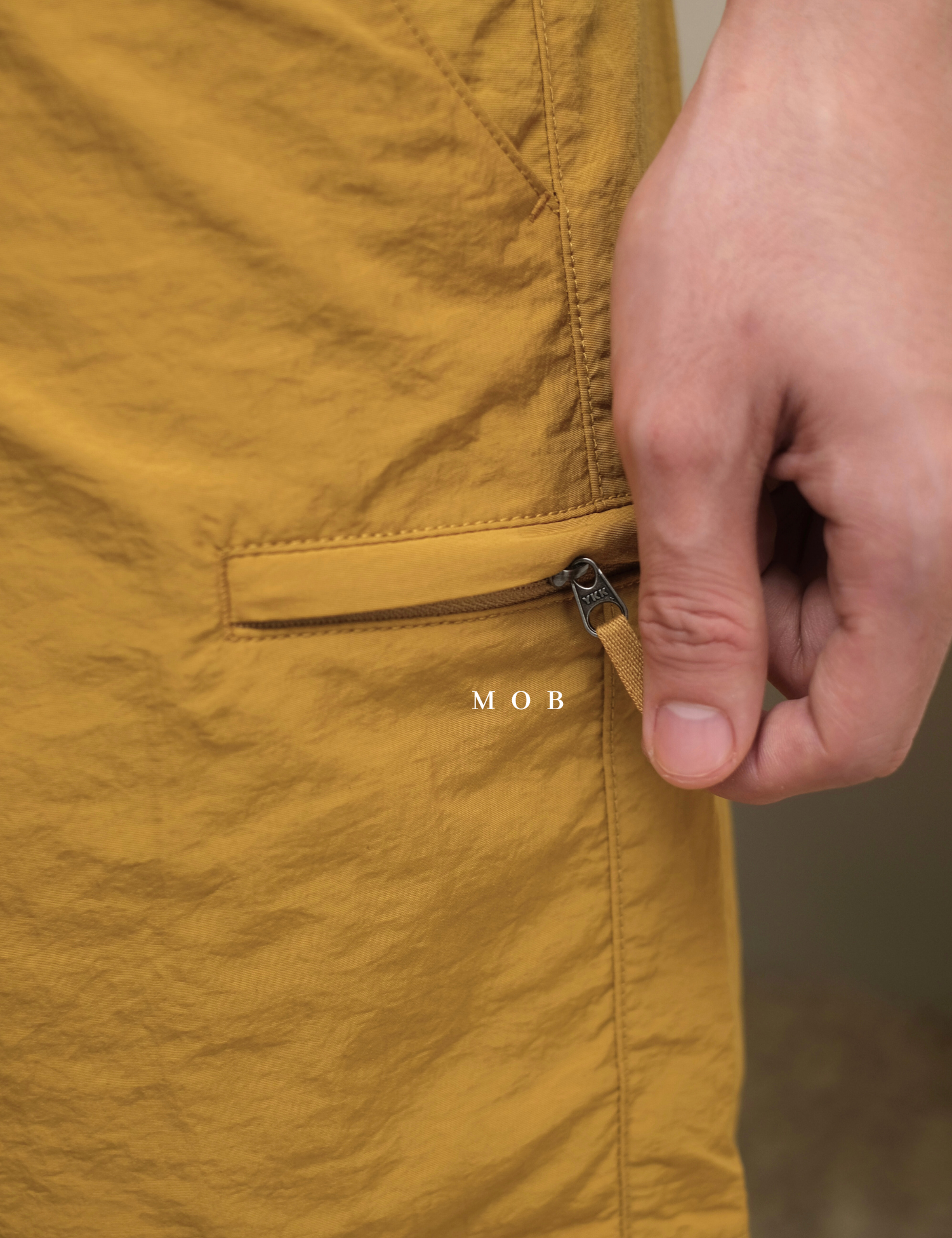 UNQSR02004 Active Nylon Shorts Mustard