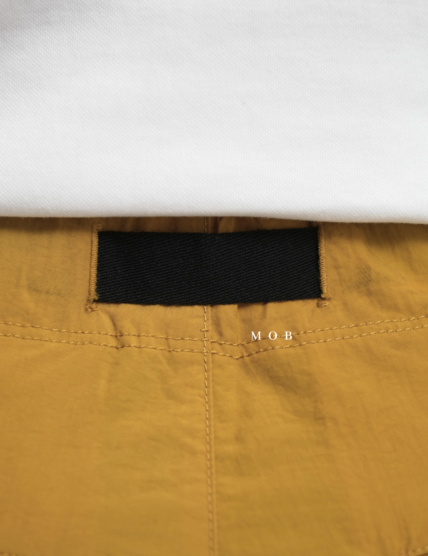 UNQSR02004 Active Nylon Shorts Mustard