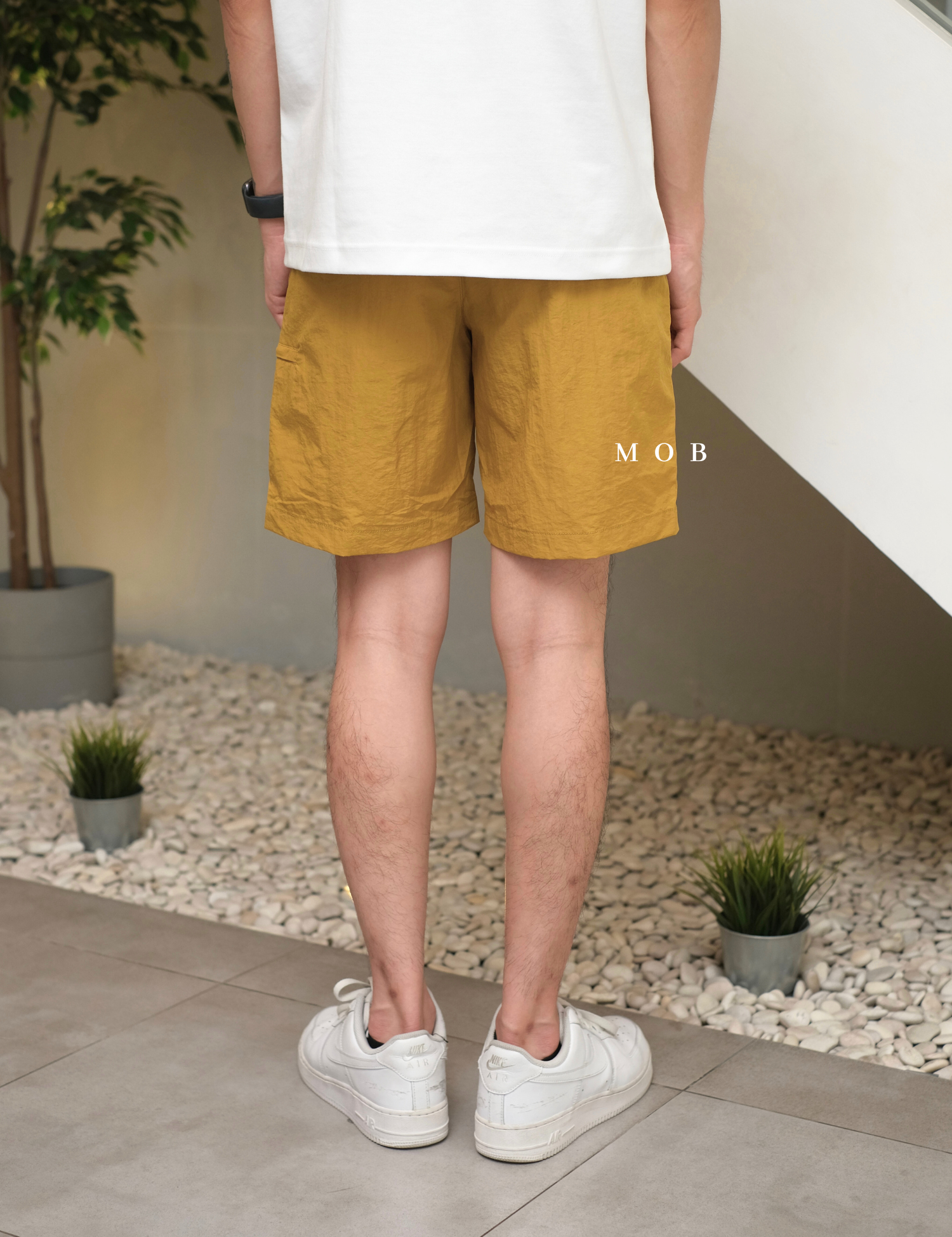 UNQSR02004 Active Nylon Shorts Mustard