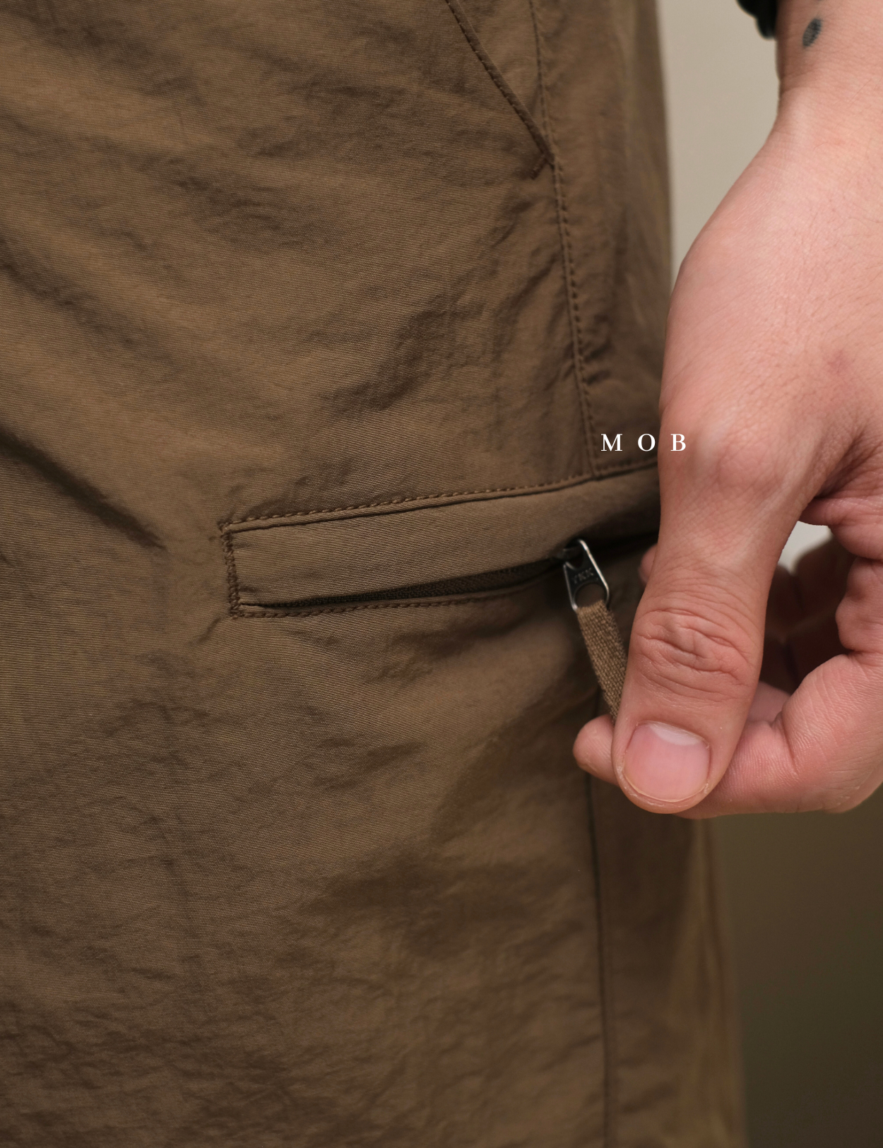 UNQSR02001 Active Nylon Shorts Dark Brown