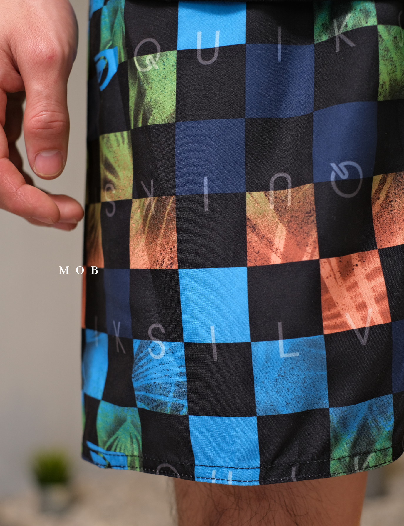 QSBS02001 Volley Shorts Black Orange Plaid