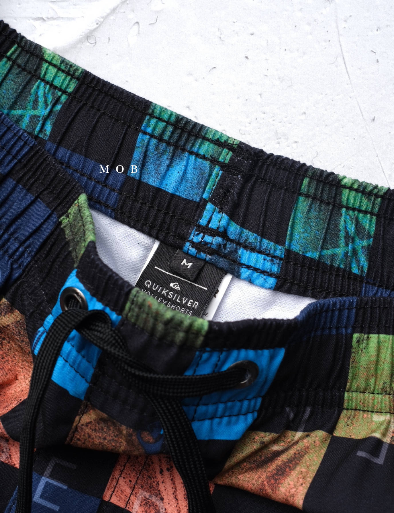 QSBS02001 Volley Shorts Black Orange Plaid