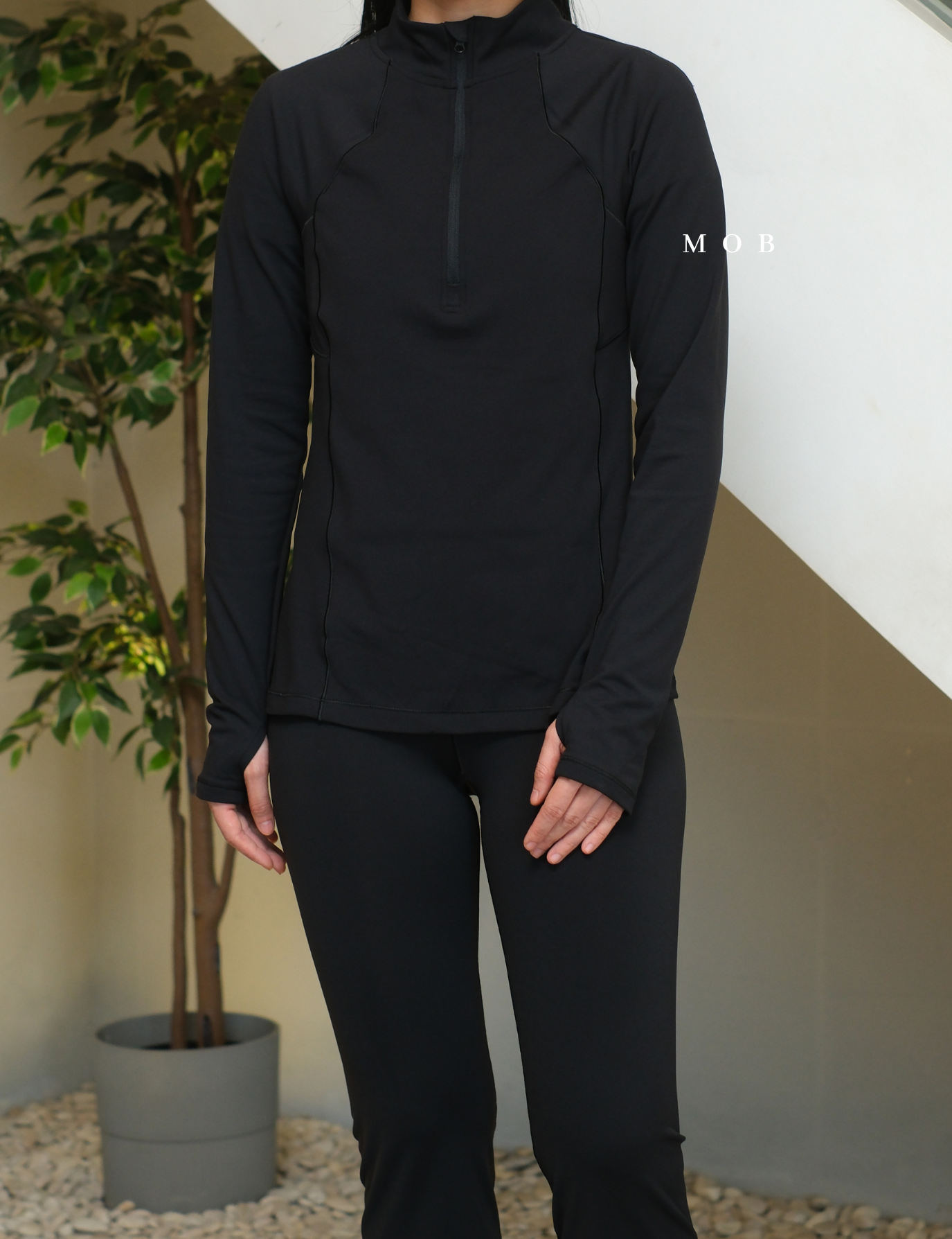 SPYJ03001A Active 1/2 Zipper Jacket Black