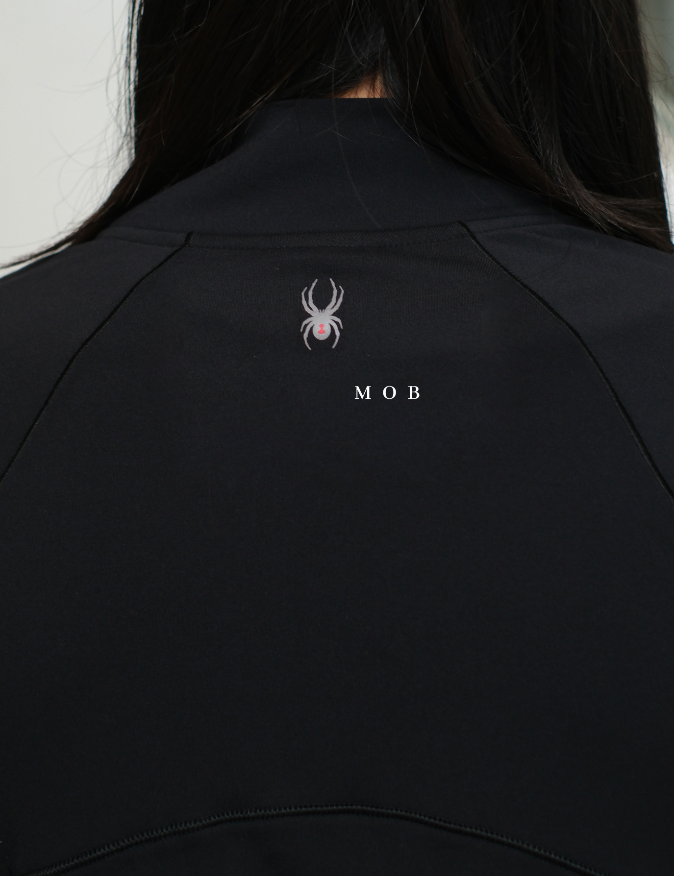 SPYJ03001A Active 1/2 Zipper Jacket Black