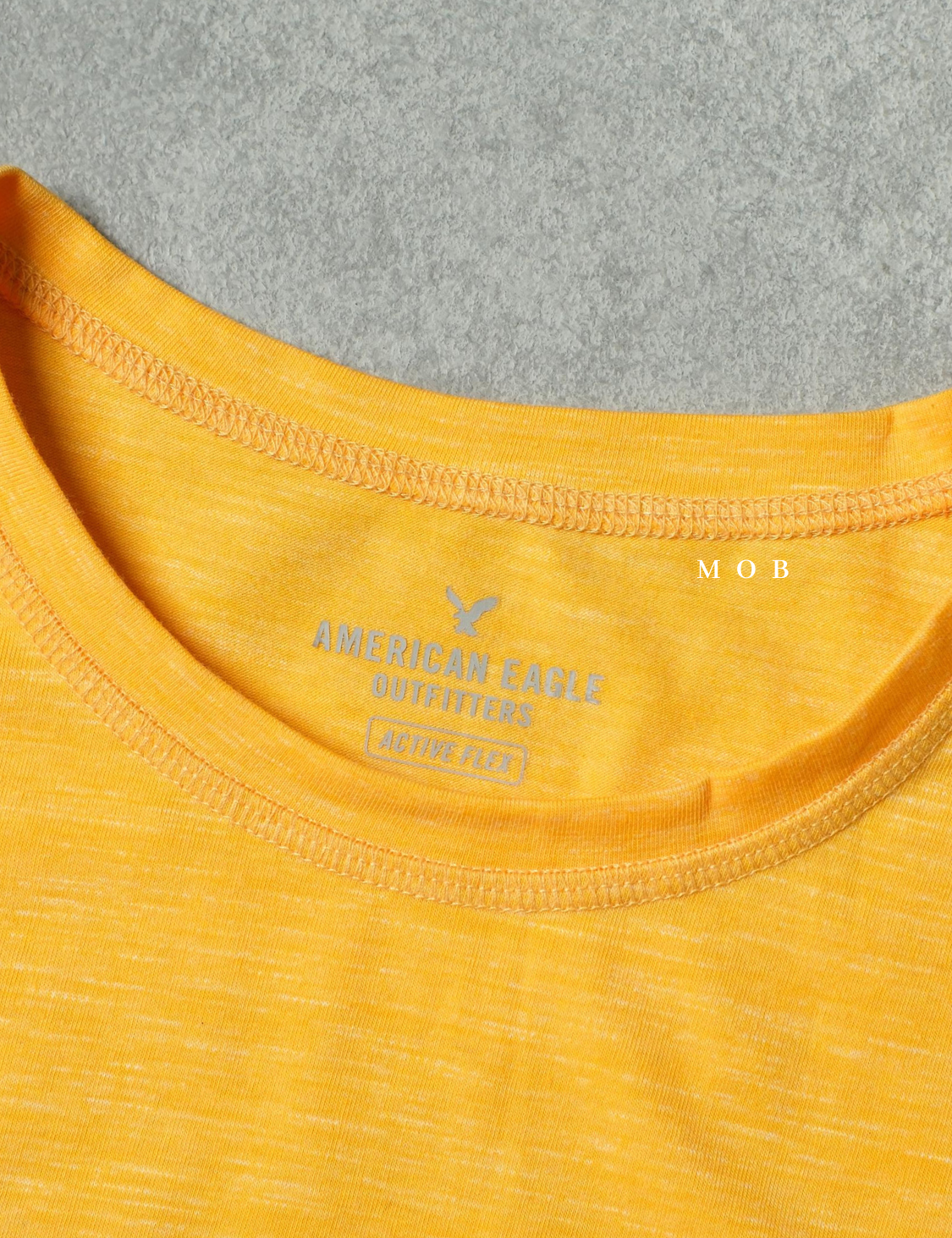 AESST06001B Active Flex Square Logo SS Tee Yellow (S ONLY)