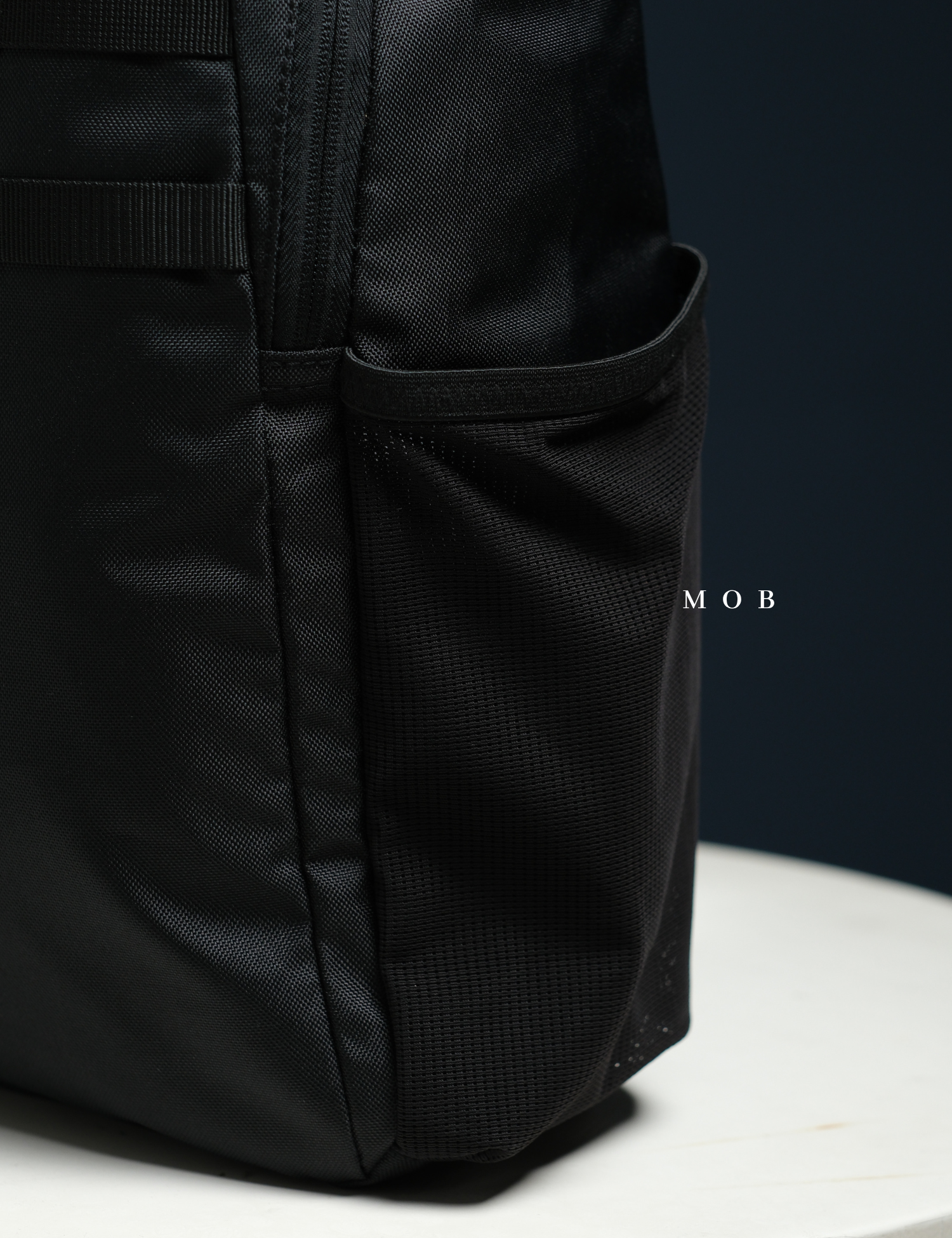 OGBAG02010A Court Recycled Sling Backpack Black