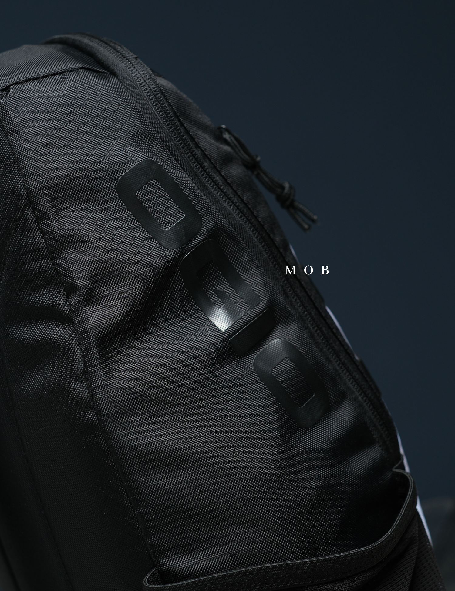 OGBAG02010B Court Recycled Sling Backpack Black Camo