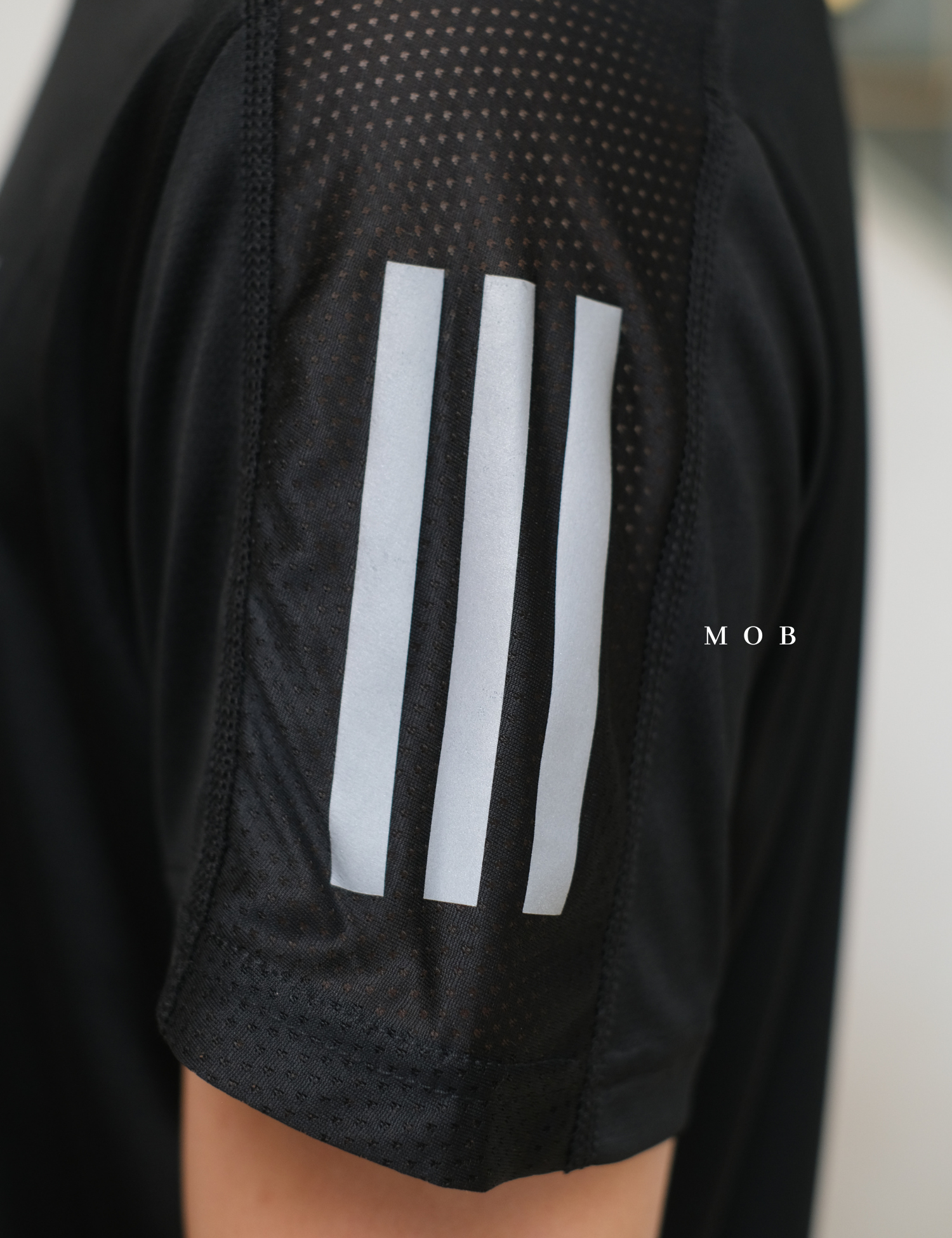 ADDSSST07004B Own The Run SS Tee SIDE Aeroready Black (M ONLY)