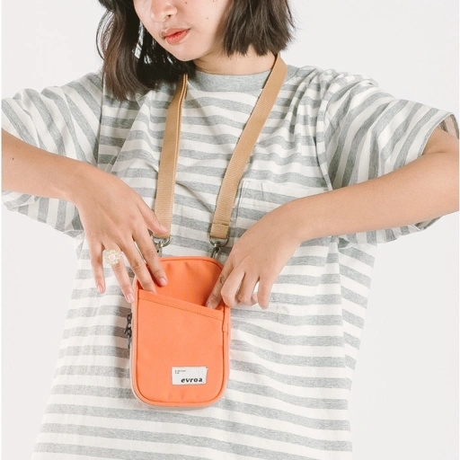 Image of Evroa Polka Sling Phone - Peach