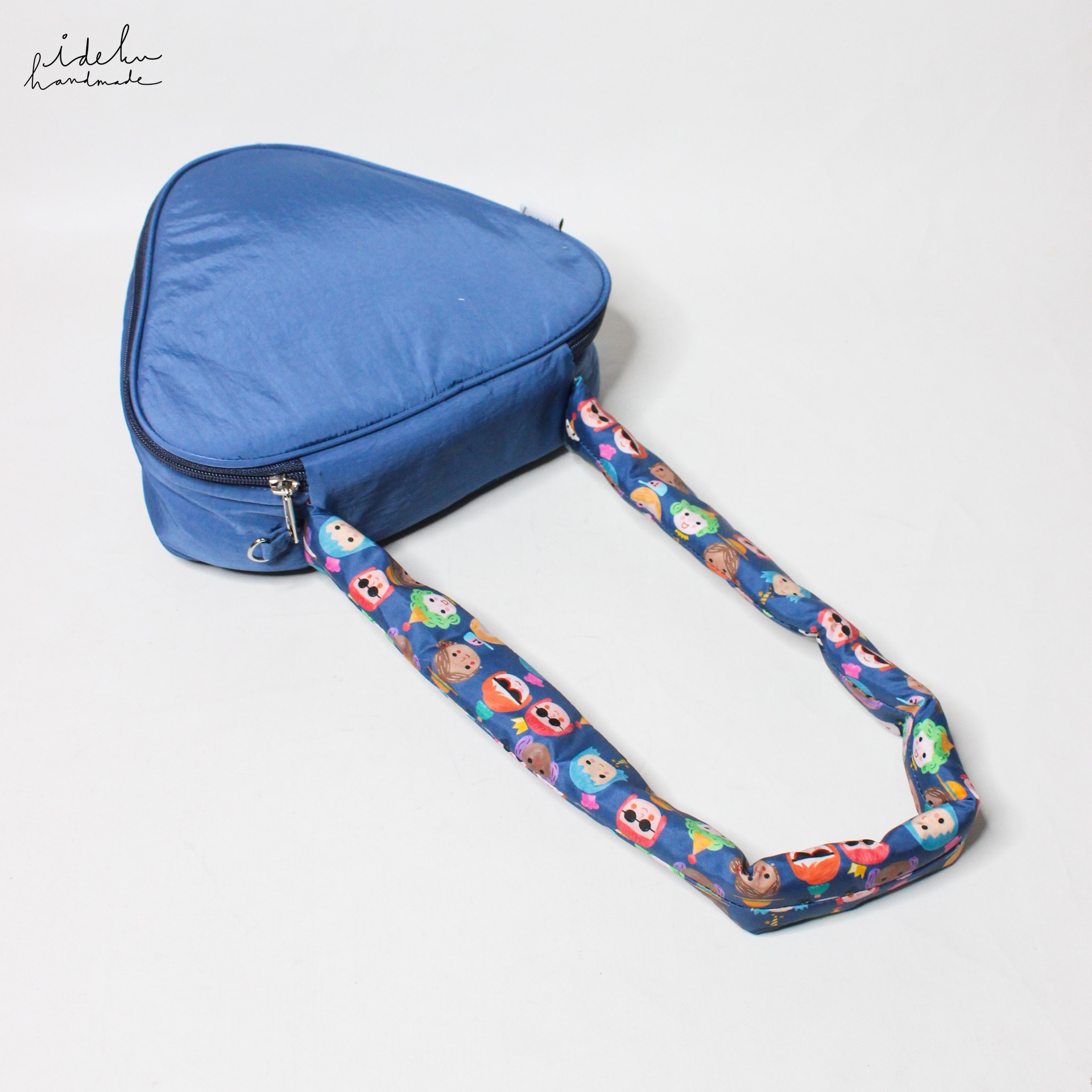 Party Faces Triangle Bag