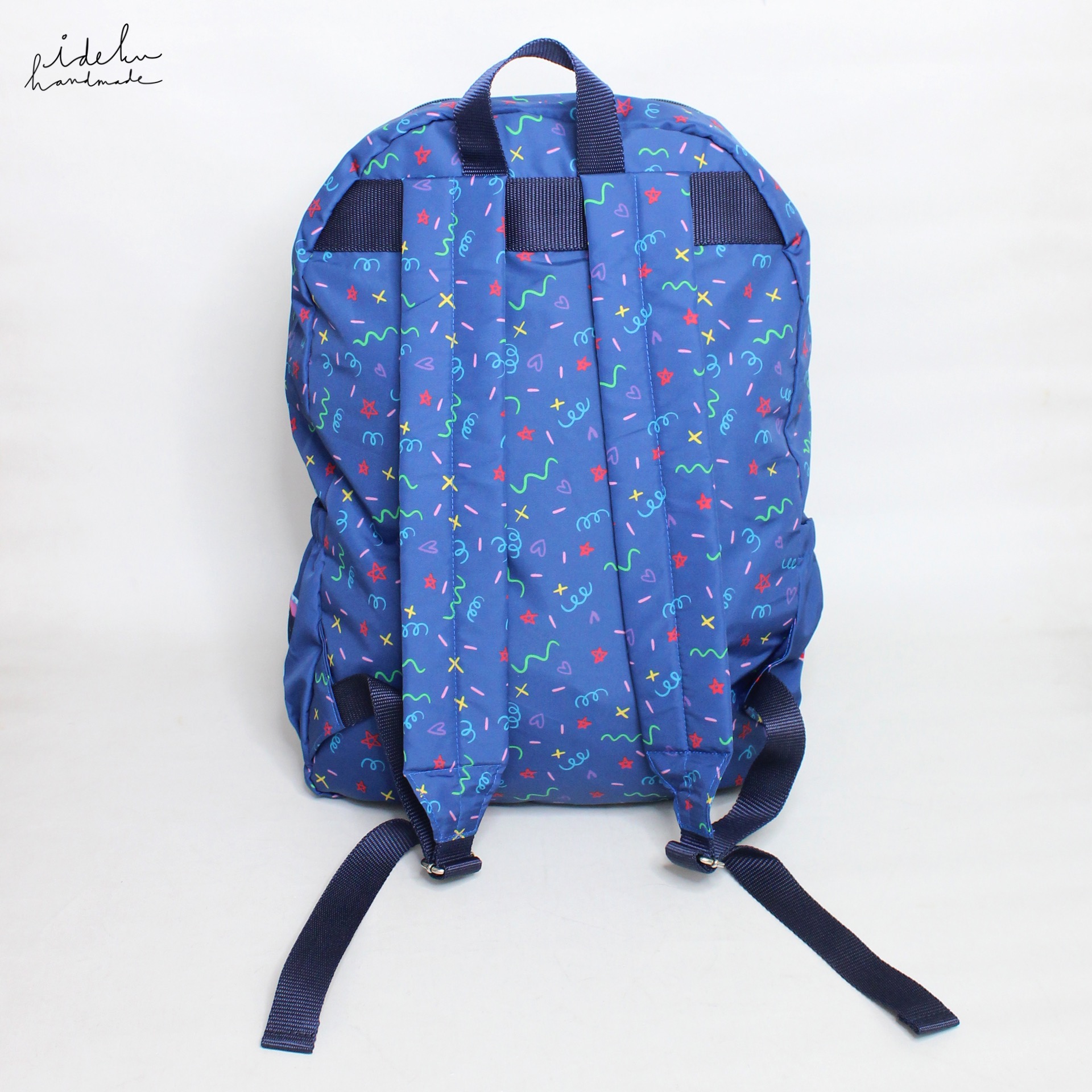Party Faces Foldable Backpack